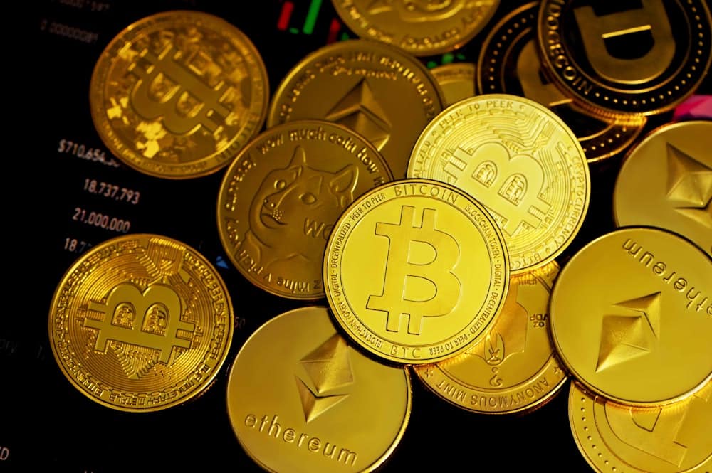 Different cryptocurrencies as coins, including Bitcoin, Ether, and Dogecoin