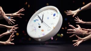 Arms reaching for clock